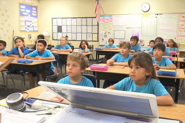 Students listen attentively in the classroom.